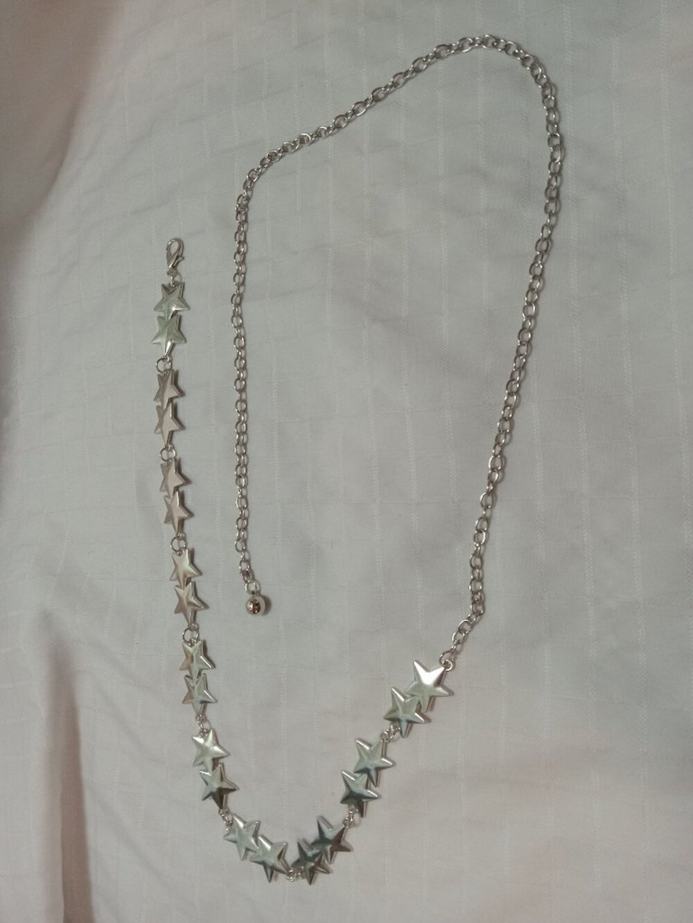 Pretty belt with stars in a silvercolor 42 inches